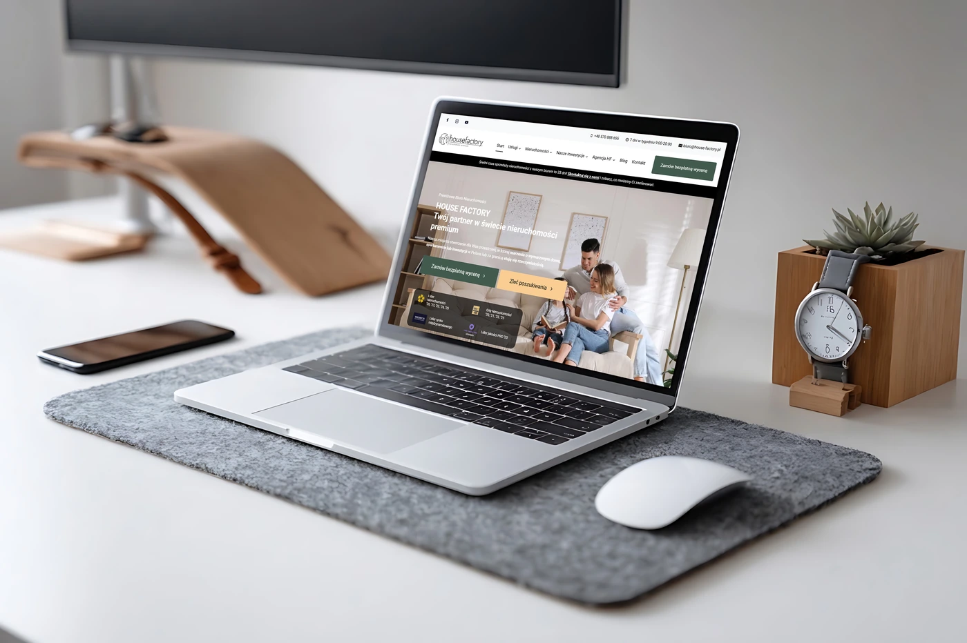 Redesign strony internetowej 1 housefactory laptop nieruchomosci